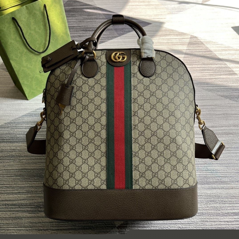 G*u*i top handle bags
